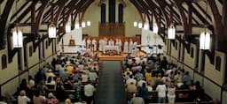 <p>Gabe Souza/Staff Photographer<br />
Parishioners at St. John the Evangelist Catholic Church in South Portland celebrated their last mass their Wednesday night, September 11, 2013. The church will merge with Holy Cross, also in South Portland, and the building will be sold.</p>
