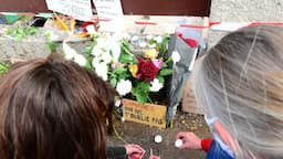 <p>Mérignac, le 5 mai 2021 devant le domicile de la victime. © MEHDI FEDOUACH / AFP</p>
