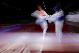 <p>Gabon&#8217;s Anthony Mylann Obame (Blue) and Slovenia&#8217;s Ivan Konrad Trajkovic (Red) compete in the taekwondo men&#8217;s +80kg elimination round bout during the Tokyo 2020 Olympic Games at the Makuhari Messe Hall in Tokyo on July 27, 2021.<br />
Javier SORIANO / AFP</p>
